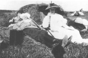 Family cuddle on haystack